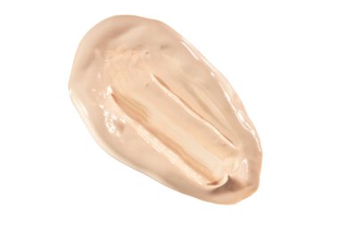 İzole edilmiş beyaz arka planda, kırpma yolu olan açık bej tonik bir temel. Makyaj ve cilt bakımı için makyaj ürünleri.