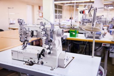 3 Needle coverstitch  Industrial Machine With Cover and Motor clipart