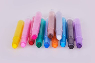 New twistable colorful pencils for coloring on a white background