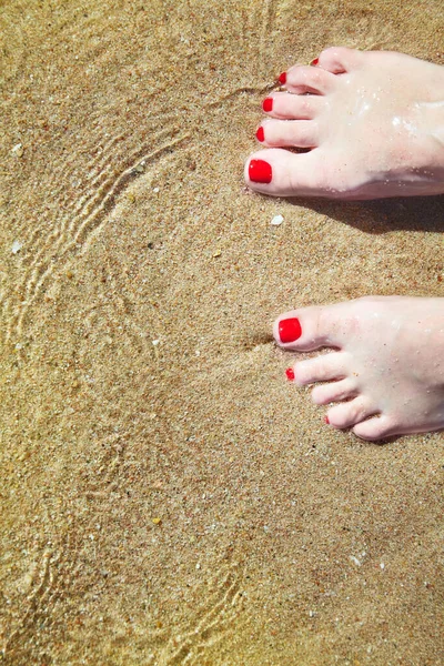 Woman Pedicured Feet Red Nail Polish Toes Sand Water Bare — Stockfoto