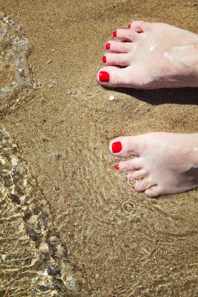 Woman Pedicured Feet Red Nail Polish Toes Sand Water Bare — Stockfoto