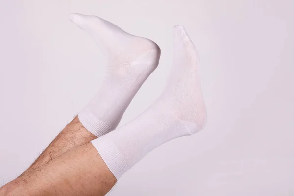 Man Wearing New White Cotton Blank Socks White Background Detailed — стоковое фото