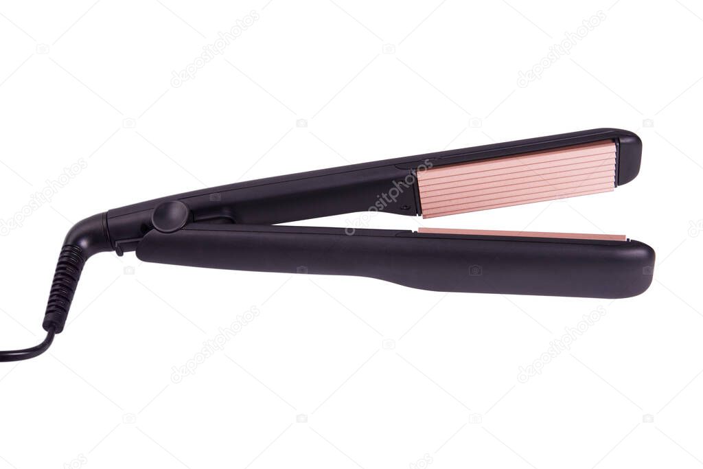 Hair corrugation iron isolated on a white background with clipping path. Barber tools, hairdressing concept