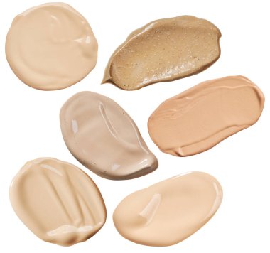 Sıvı temel krem numunesi lekesi. Açık bej makyaj kapatıcı vuruşu beyaz arka planda izole edildi. Çıplak makyaj malzemesi.