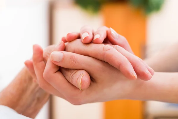 Elderly patient getting support — Stock Photo, Image