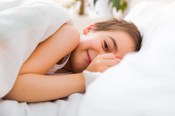 Little boy laying in bed — Stock Photo, Image