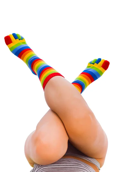 Striped socks on cold feet — Stock Photo, Image