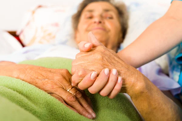 Caring Nurse Holding Hands — Stock Photo, Image