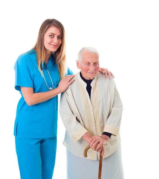 Oudere patiënten en jonge verzorger — Stockfoto