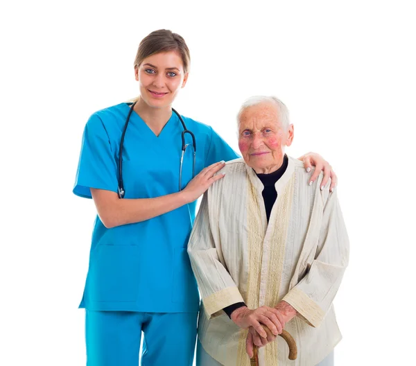 Médecin soutenant une femme âgée malade — Photo