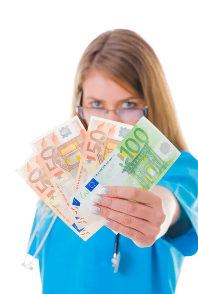 Healthcare worker with 250 Euro in her hands — Stock Photo, Image