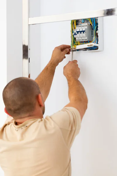 Electrician Man Fixing Fuse — Stock Photo, Image