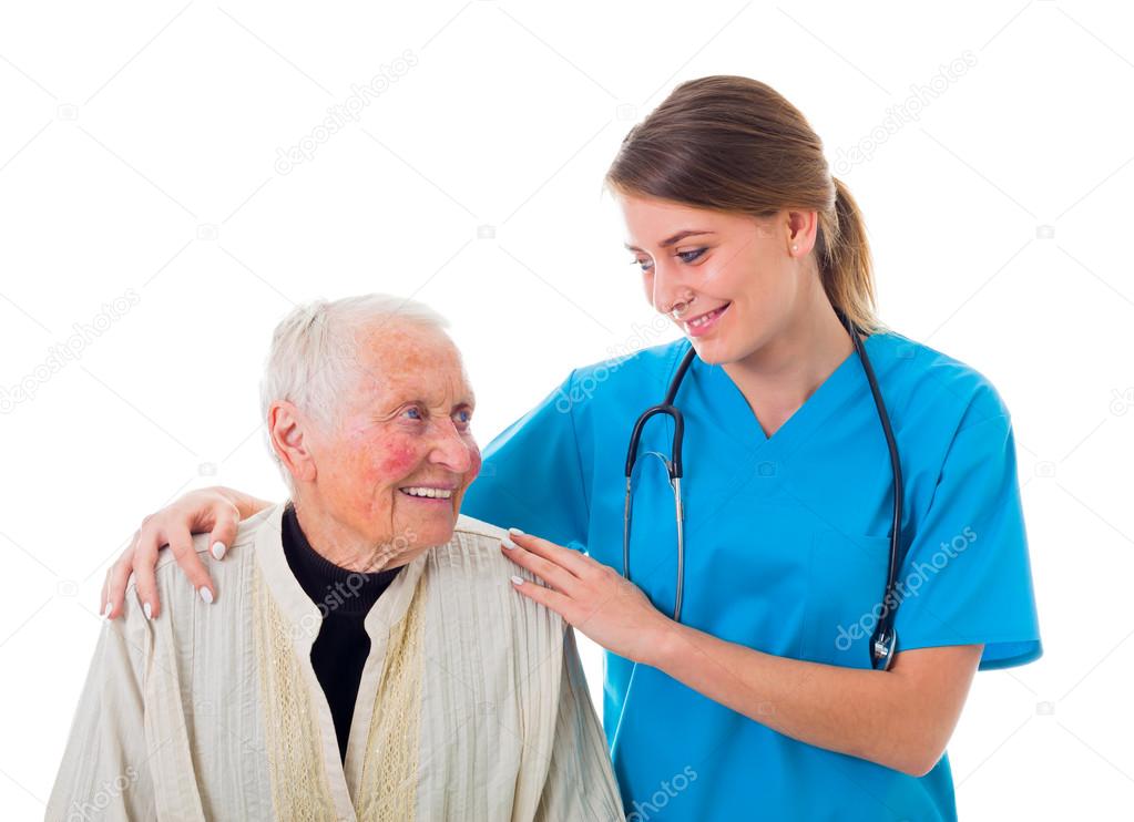 caretaker supporting a sick elderly woman