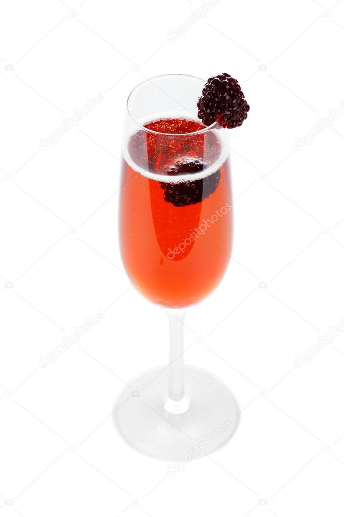 Delicious cocktail with champagne and currant liqueur