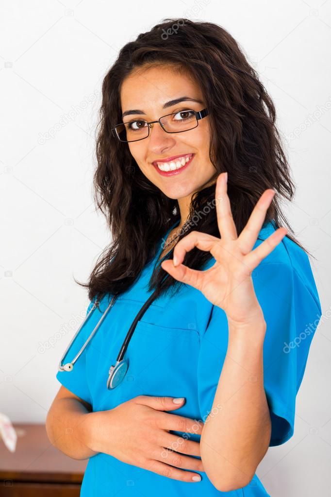 doctor woman showing like sign
