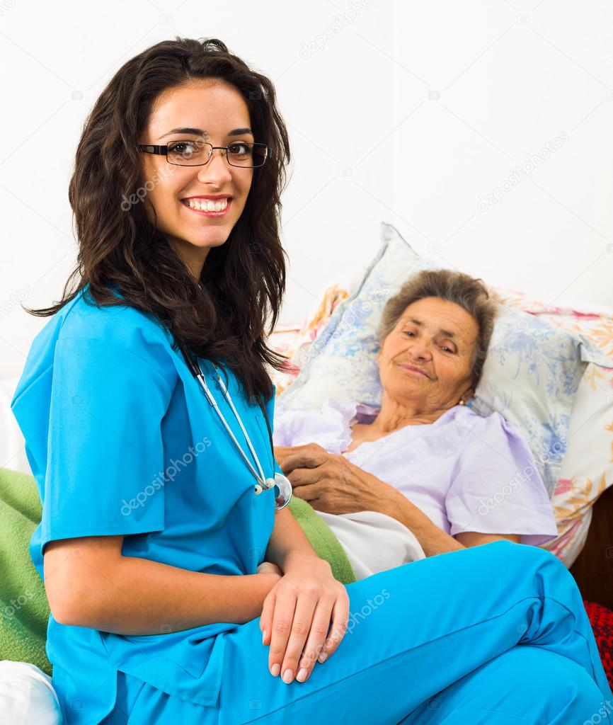 Kind Nurse with Elderly patient