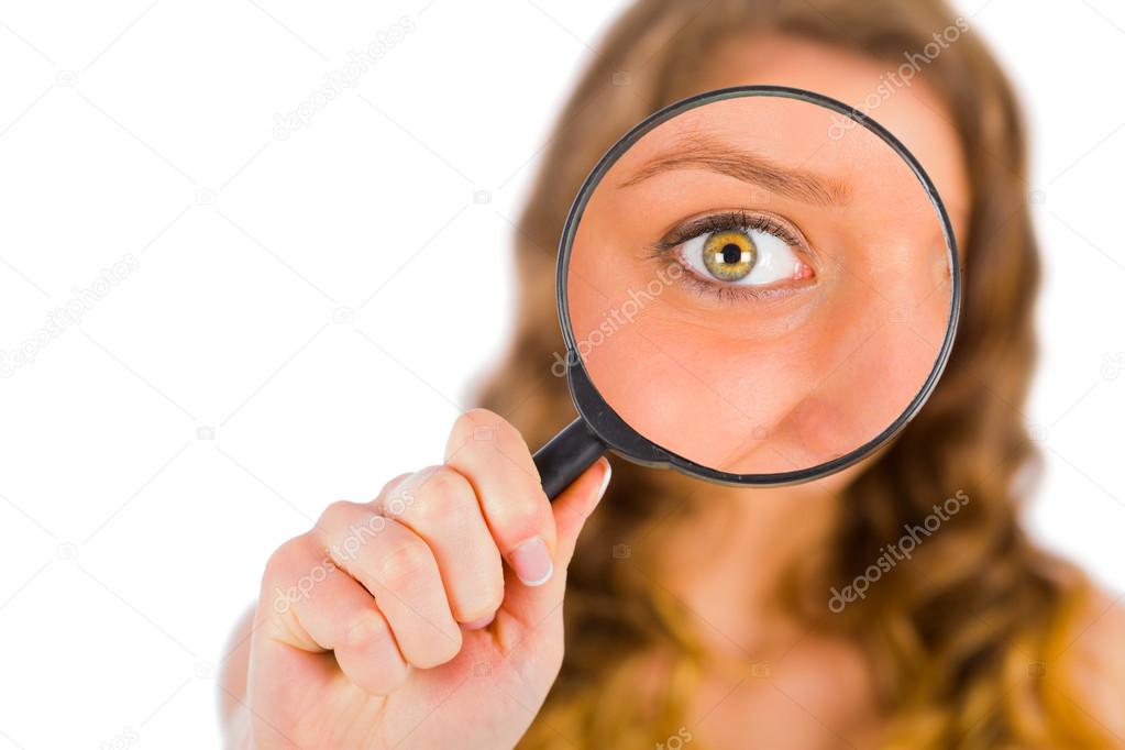 lady holding a magnifying glass