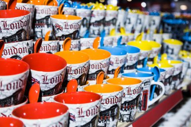 Colorful mugs in  souvenir shop