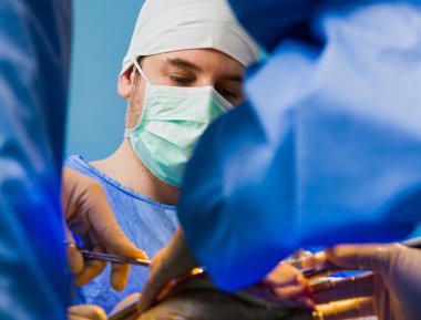 Focusing surgeon ER clipart