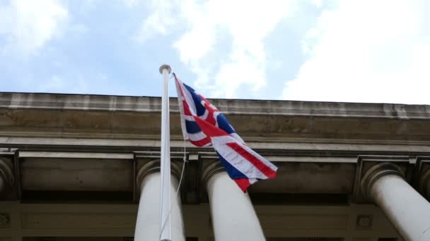 British flag waving in wind in UK, United Kingdom, national symbol — Stock Video