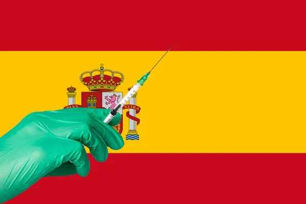 Vacunación Con Corona Frente Una Bandera España —  Fotos de Stock