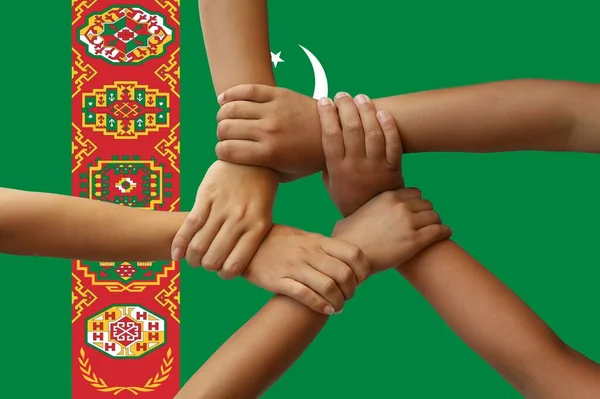 Turkmenistan flag, intergration of a multicultural group of young people — Stock Photo, Image