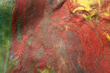 Mermer bir arka planda akrilik boya ve yağ karışımının makro çekimi..