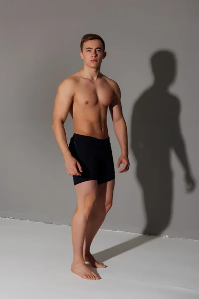 Sports man showing his torso — Stock Photo, Image