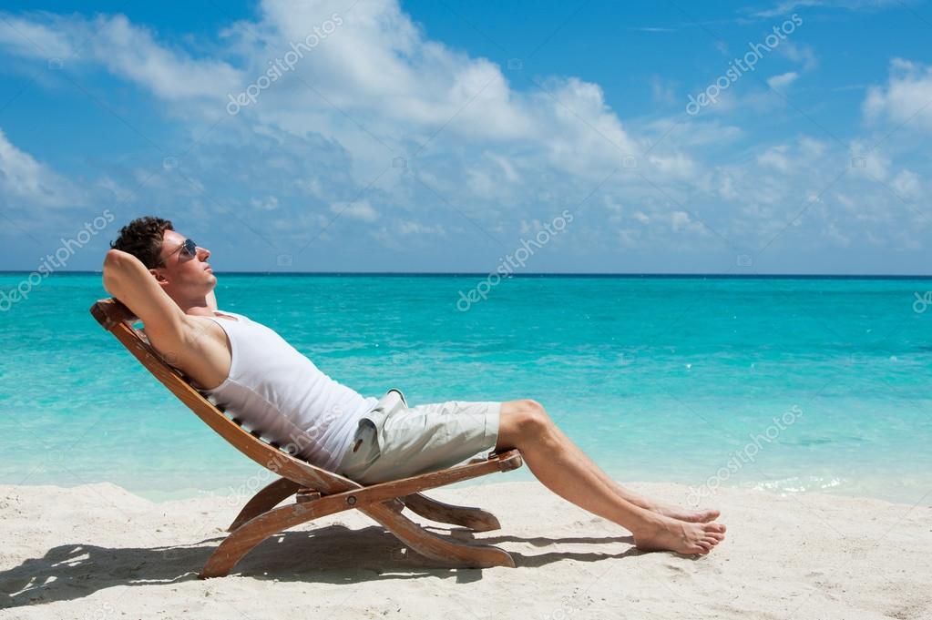 Man sunbathing Stock Photo by ©maxsaf 54788755