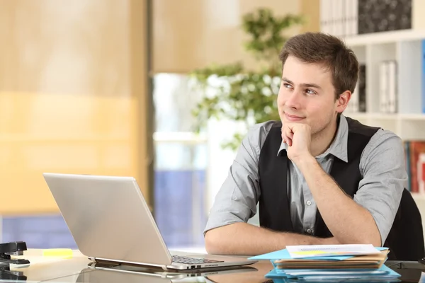 Businessman thinking and planning at office — Stock Photo, Image