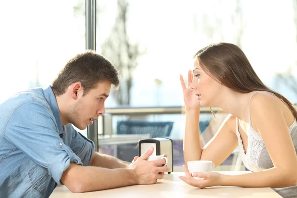 Man looking at cleavage bosom of a girl in a date — Stock Photo, Image