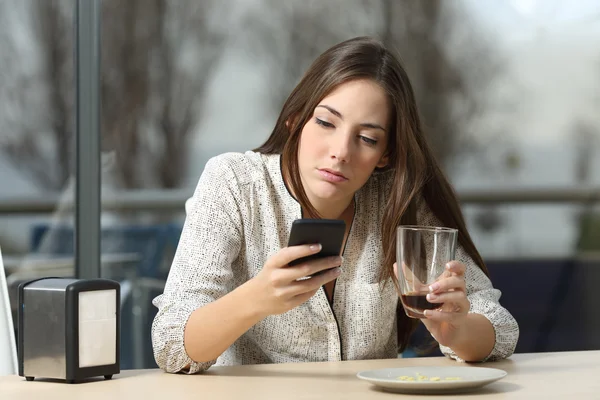 Woman stood up in a coffee shop