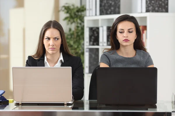 Angry businesswomen looking with hate — Stock Photo, Image