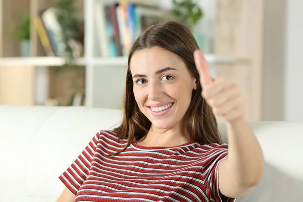 Happy Woman Smiling Camera Thumb Sitting Couch Living Room Home — Stock Photo, Image