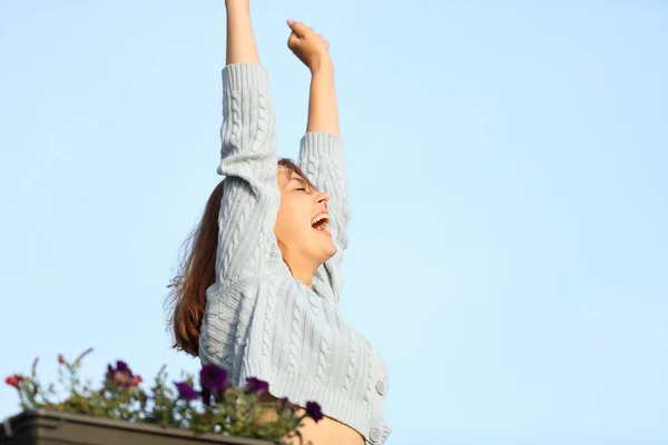 Excited Tenant Raising Arms Celebrating Success Balcony — 图库照片