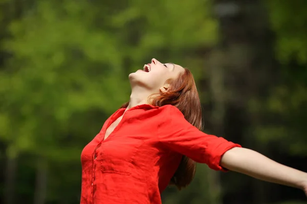 Happy Woman Red Screaming Air Stretching Arms Forest Park — Stock fotografie