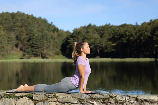 Side View Portrait Woman Doing Yoga Pose Lake Sunny Day — Fotografia de Stock
