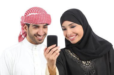 Arab couple sharing social media on the smart phone clipart