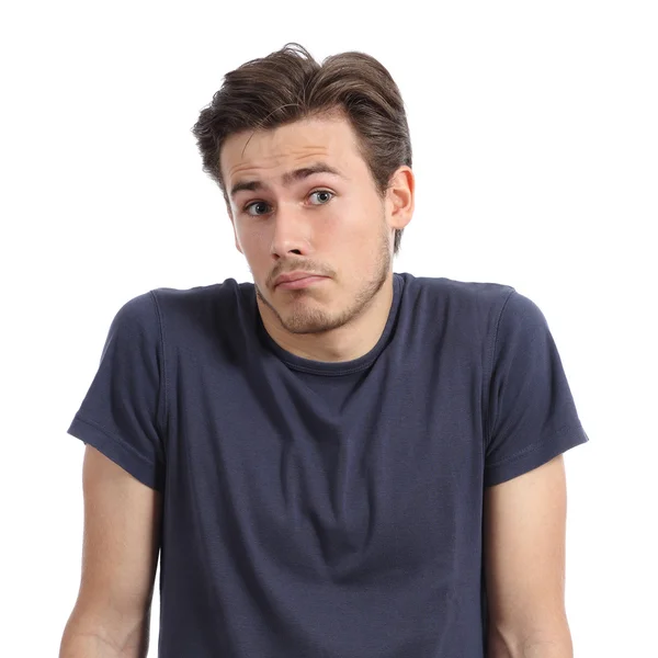 Front portrait of a young man doubting shrugging shoulders — Stock Photo, Image