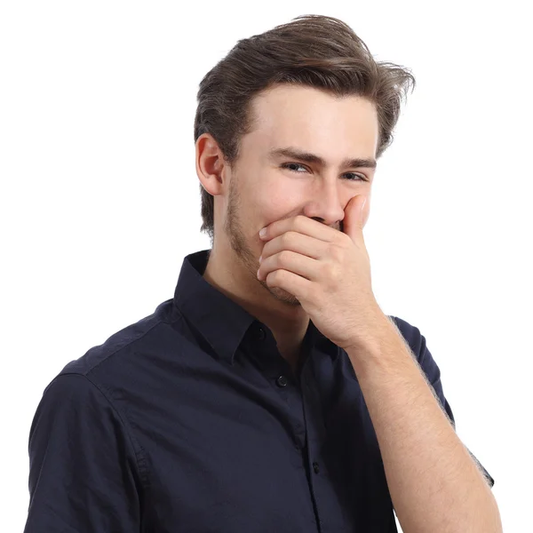 Handsome man laughing while covering his mouth with a hand — Stock Photo, Image