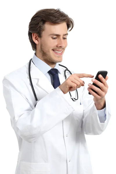 Happy doctor man texting on a smart phone — Stock Photo, Image