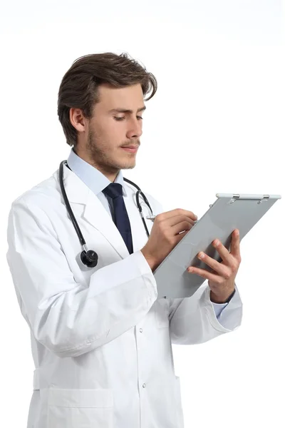 Serious doctor man whiting a medical history — Stock Photo, Image