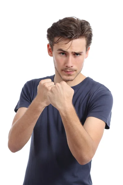 Casual jovem pronto para lutar atacando com punho para cima — Fotografia de Stock