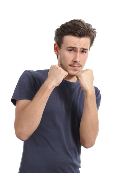 Casual jovem pronto para lutar defendendo com punho para cima — Fotografia de Stock