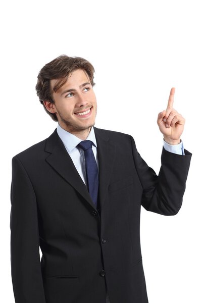 Young happy businessman presenting and pointing at side