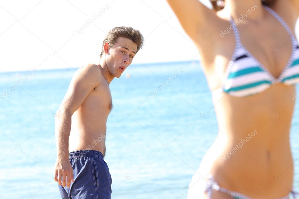 Amazed man looking at woman sexy body