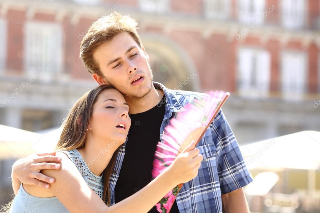 Couple suffering summer heat