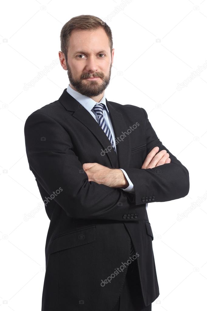 Serious businessman posing with folded arms