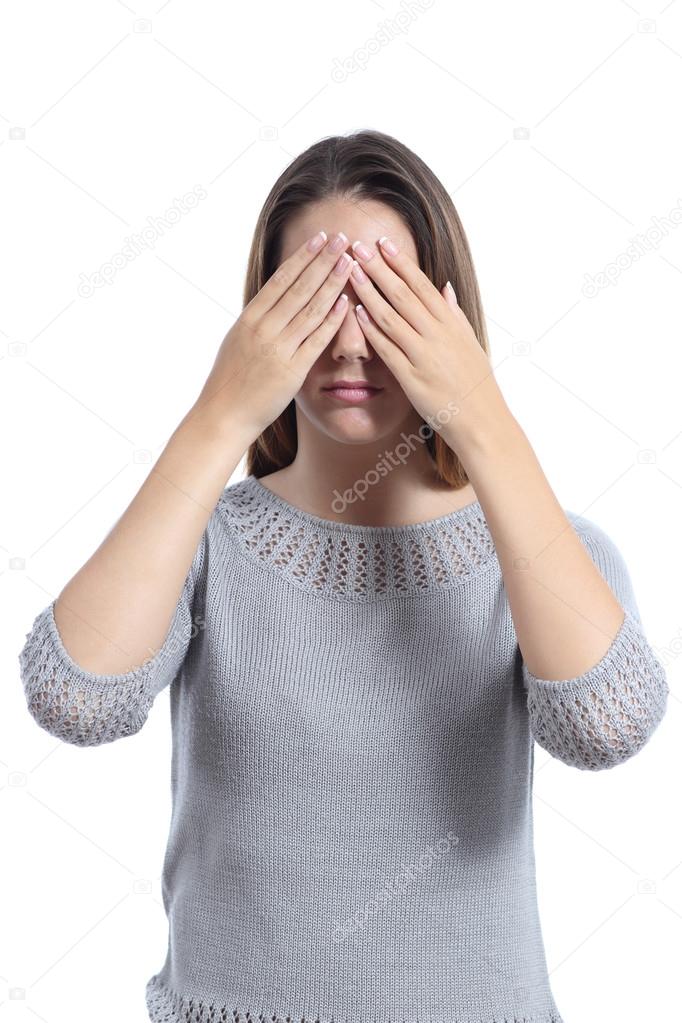 Woman covering her eyes with hands