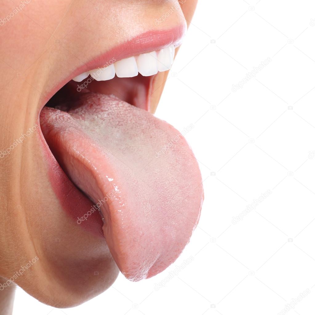 Close up of a woman mouth sticking tongue